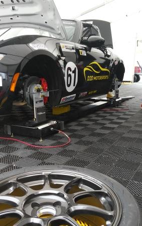 ProPLUS HUBStands brand hub stands and alignment equipment on an MX 5 Cup car